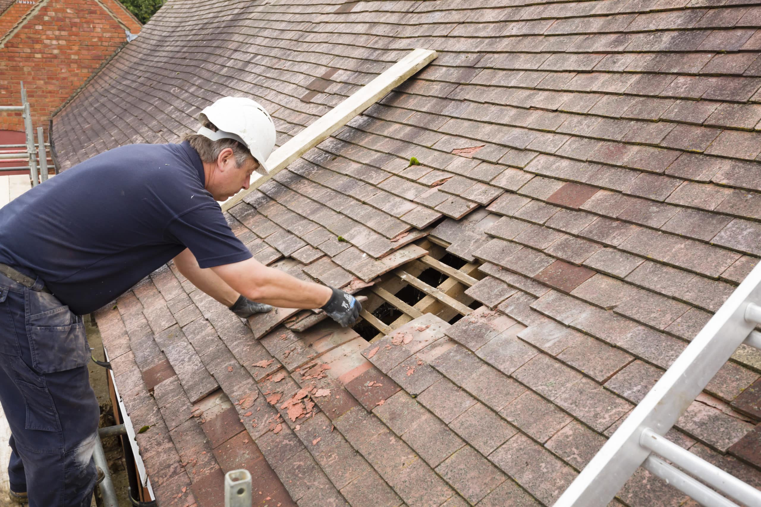 roofing-repair-contractor-fixing-clay-tiles-hammonton-nj