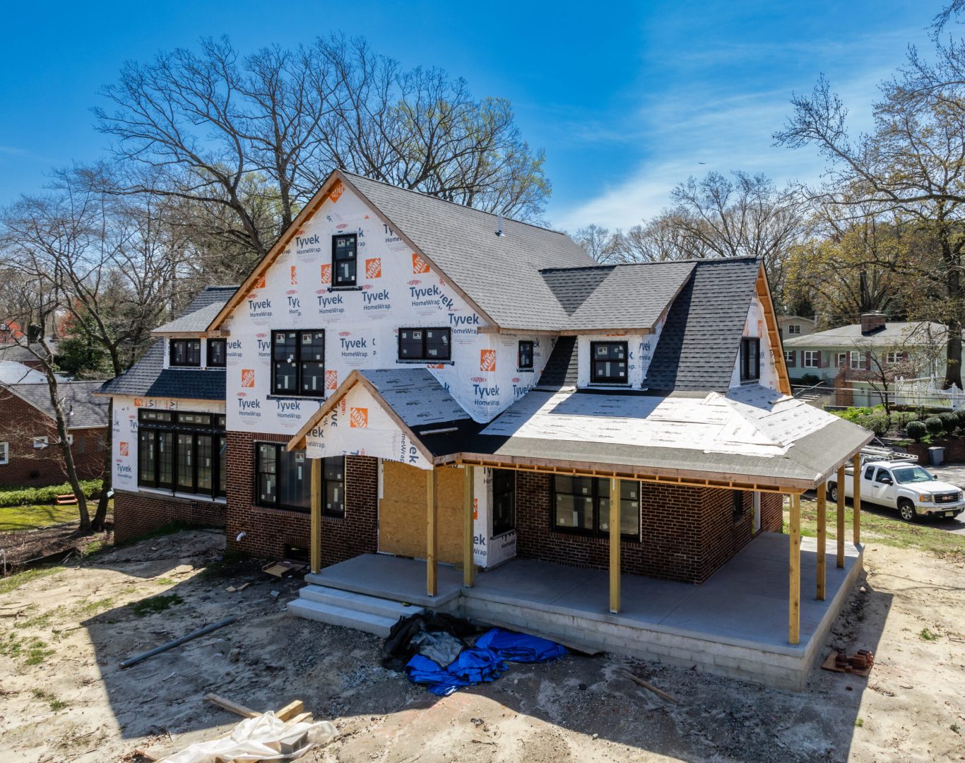 Professional team installing siding on a house in New Jersey.