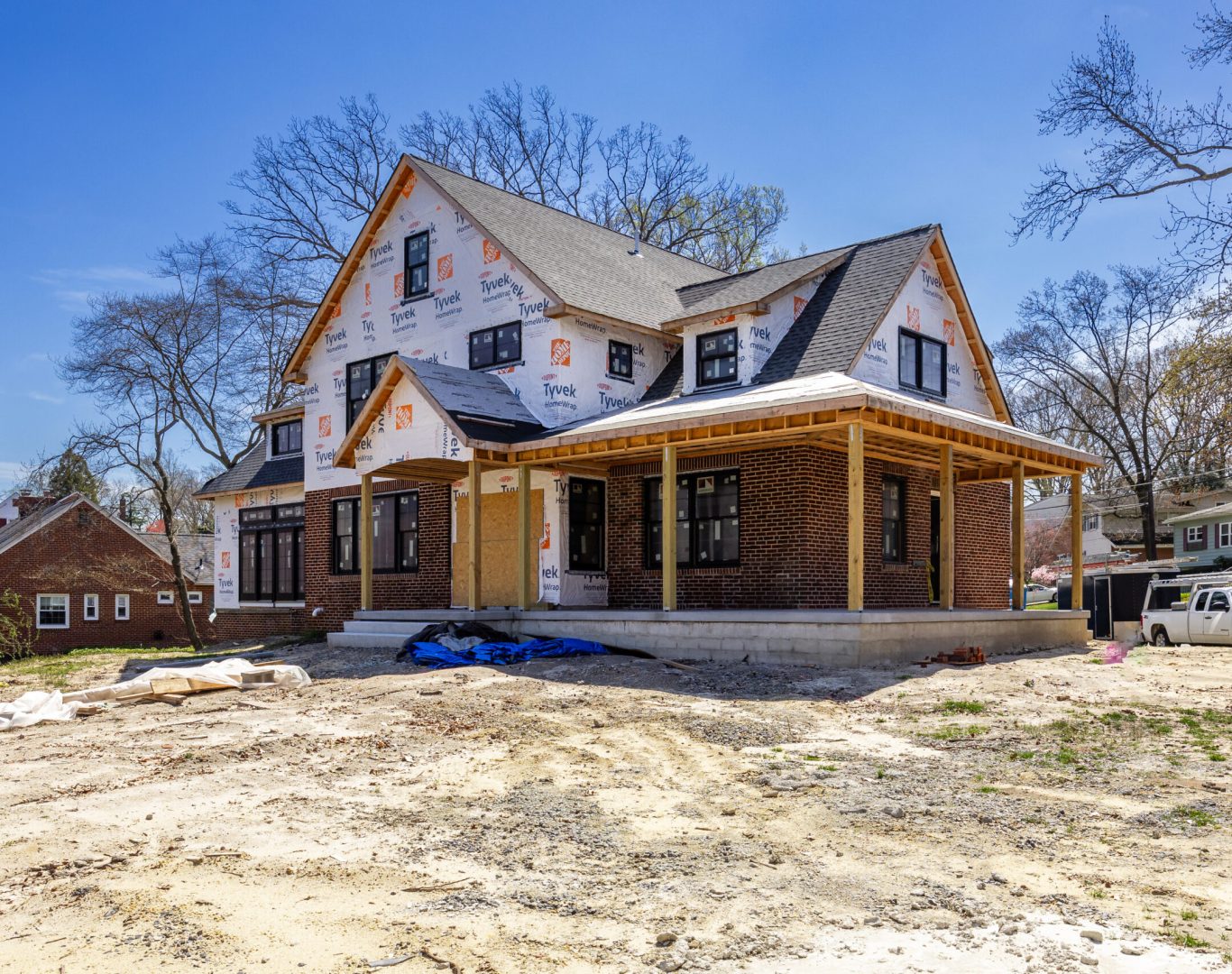 Professional team installing siding on a house in New Jersey.