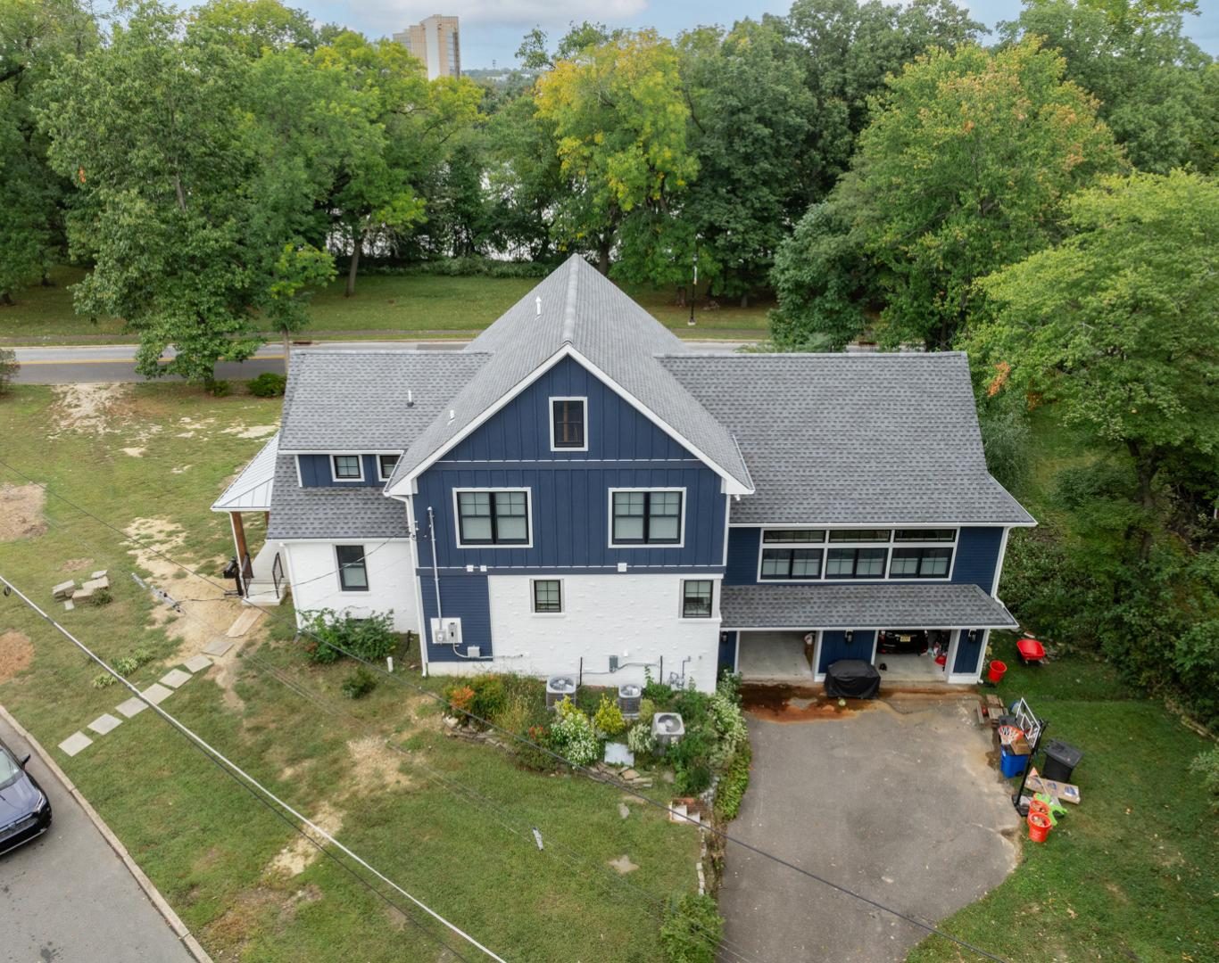 Skilled roofing contractor in Mullica Hill, NJ completing a high-quality shingle installation
